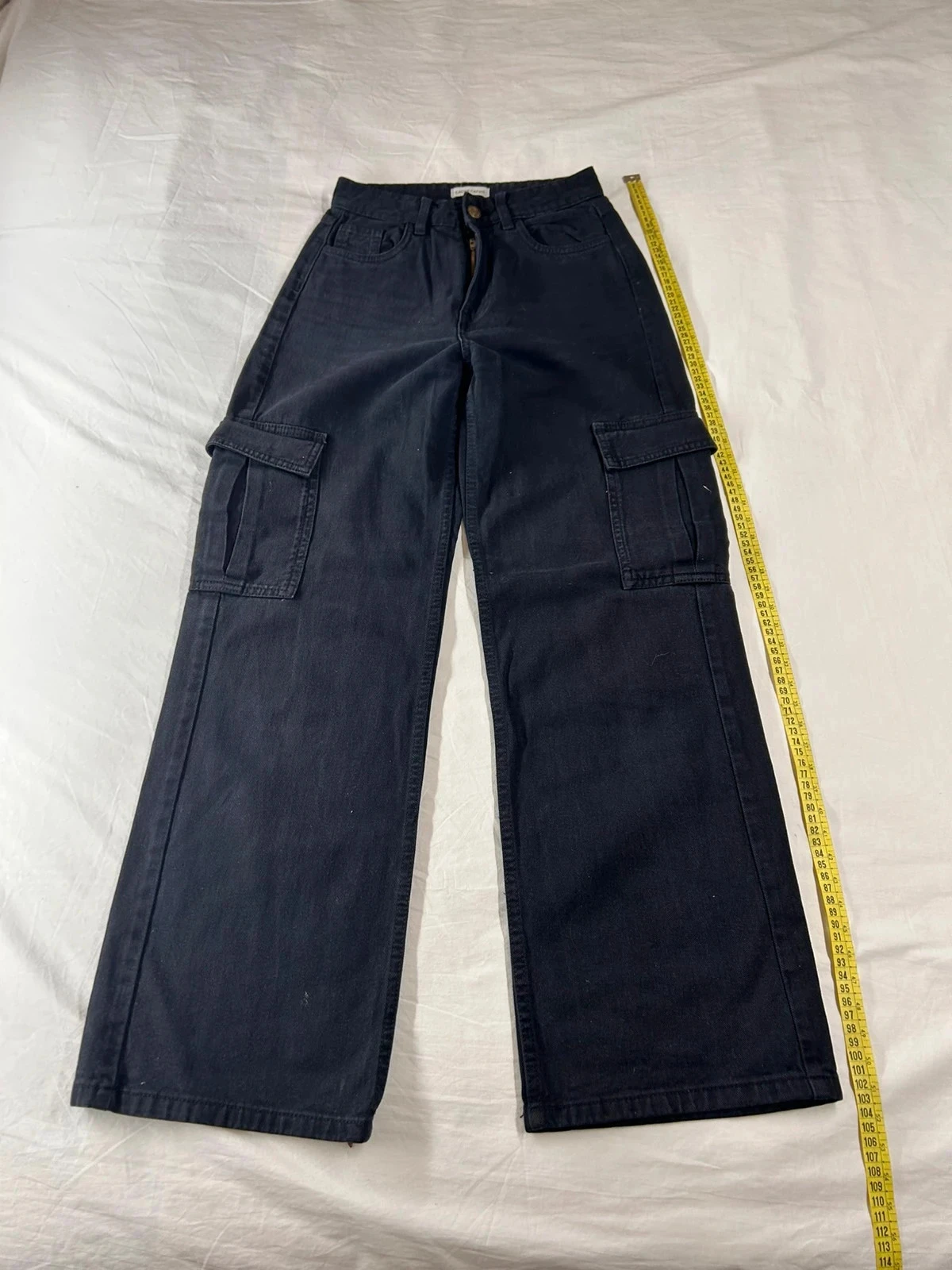 Pantalon à jambes larges noir cache cache